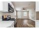 Bright living room with hardwood floors and ceiling fan at 1913 Nw 12Th St, Ocala, FL 34475