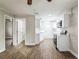 Open concept living area with kitchen and hardwood floors at 1913 Nw 12Th St, Ocala, FL 34475