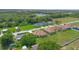 A beautiful aerial view of the neighborhood, showcasing lush landscaping and a nearby lake at 1943 Sipes Ave, Sanford, FL 32771