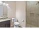 Modern bathroom with a glass shower and granite countertop at 1943 Sipes Ave, Sanford, FL 32771