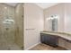 Large bathroom with walk-in shower and granite vanity at 1943 Sipes Ave, Sanford, FL 32771