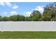White vinyl fence providing privacy and security at 1943 Sipes Ave, Sanford, FL 32771