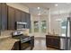 Modern kitchen with stainless steel appliances and granite countertops at 1943 Sipes Ave, Sanford, FL 32771