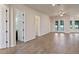 Open living space with tile floors and access to other rooms at 1943 Sipes Ave, Sanford, FL 32771