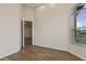 Office with wood-look tile floors and an open doorway at 1943 Sipes Ave, Sanford, FL 32771
