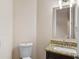 Small powder room with granite vanity and modern fixtures at 1943 Sipes Ave, Sanford, FL 32771