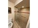 Bathroom with large walk-in shower and grab bars at 2465 Grand Teton Cir # 2465, Winter Park, FL 32792