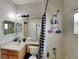 Clean bathroom with a shower, toilet, and vanity at 2739 Star Grass Cir, Kissimmee, FL 34746
