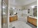 Large bathroom with double sinks, garden tub, and shower at 2739 Star Grass Cir, Kissimmee, FL 34746