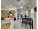 Kitchen with breakfast nook and view into living room at 2739 Star Grass Cir, Kissimmee, FL 34746