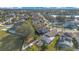 Aerial view showcasing home, pool and neighborhood at 3251 Brewster Dr, Kissimmee, FL 34743