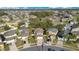 Aerial view of house and surrounding homes at 3251 Brewster Dr, Kissimmee, FL 34743
