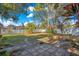 Large backyard with brick patio and green space at 3251 Brewster Dr, Kissimmee, FL 34743