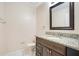Simple bathroom with single vanity, granite countertop, and tiled flooring at 3251 Brewster Dr, Kissimmee, FL 34743