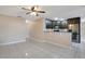 Modern kitchen with dark brown cabinets and granite countertops at 3251 Brewster Dr, Kissimmee, FL 34743