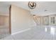 Bright living room with tile floors and a staircase at 3251 Brewster Dr, Kissimmee, FL 34743