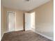 Spacious bedroom with wood-look floors and a closet at 421 Jefferson St, Daytona Beach, FL 32114