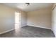 Bedroom with door to hallway and additional room at 421 Jefferson St, Daytona Beach, FL 32114