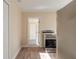 Modern kitchen with stainless steel appliances and white cabinets at 421 Jefferson St, Daytona Beach, FL 32114