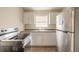 Efficient kitchen featuring stainless steel appliances and granite counters at 421 Jefferson St, Daytona Beach, FL 32114