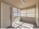 Laundry room with tile floors, and access to backyard at 421 Jefferson St, Daytona Beach, FL 32114