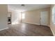 Bright living room featuring wood-look floors and an open floor plan at 421 Jefferson St, Daytona Beach, FL 32114