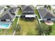 Aerial view showing house, pool and large backyard at 4847 Havilland Dr, Mount Dora, FL 32757