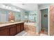 Large bathroom with a garden tub and double vanity at 4847 Havilland Dr, Mount Dora, FL 32757