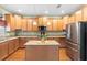 Updated kitchen, featuring stainless steel appliances and granite countertops at 4847 Havilland Dr, Mount Dora, FL 32757