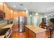 Kitchen boasts stainless steel appliances and granite countertops at 4847 Havilland Dr, Mount Dora, FL 32757
