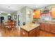 Open concept kitchen with island and stainless steel appliances at 4847 Havilland Dr, Mount Dora, FL 32757