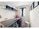 Laundry room with washer, dryer, and shelving at 4847 Havilland Dr, Mount Dora, FL 32757