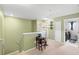 Upstairs hallway with access to laundry and bedrooms at 4847 Havilland Dr, Mount Dora, FL 32757
