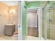 Modern bathroom with a walk-in shower and vanity at 62 W Colonial Dr # 205, Orlando, FL 32801