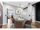 Small dining area with a round table and four chairs at 62 W Colonial Dr # 205, Orlando, FL 32801