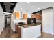 Modern kitchen with wood cabinets and granite countertops at 62 W Colonial Dr # 205, Orlando, FL 32801