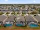 Aerial view of homes with private pools at 8106 Fan Palm Way, Kissimmee, FL 34747