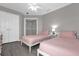 Bedroom with twin beds and a shared bathroom at 8106 Fan Palm Way, Kissimmee, FL 34747