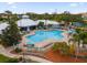 Resort-style community pool with ample seating at 8106 Fan Palm Way, Kissimmee, FL 34747