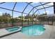 Inviting screened pool and spa at 8106 Fan Palm Way, Kissimmee, FL 34747