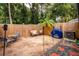 Small backyard with patio furniture and grill at 844 Sugar House Dr, Port Orange, FL 32129