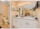 Double vanity bathroom with white cabinets at 844 Sugar House Dr, Port Orange, FL 32129