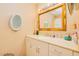 Bathroom with vanity and gold framed mirror at 844 Sugar House Dr, Port Orange, FL 32129