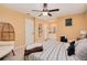Spacious bedroom with ceiling fan and carpeted floor at 844 Sugar House Dr, Port Orange, FL 32129