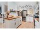 Modern kitchen with stainless steel appliances and wood countertops at 844 Sugar House Dr, Port Orange, FL 32129