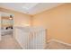Upper level landing overlooking a bedroom at 844 Sugar House Dr, Port Orange, FL 32129