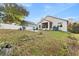Spacious backyard with patio and plenty of green space at 935 Don Wilson Ave, Apopka, FL 32712