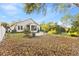 Large backyard with patio, covered screened porch and nature views at 935 Don Wilson Ave, Apopka, FL 32712
