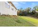 Landscaped backyard with grassy area and privacy at 935 Don Wilson Ave, Apopka, FL 32712