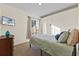 Cozy bedroom with a double bed and a view at 935 Don Wilson Ave, Apopka, FL 32712